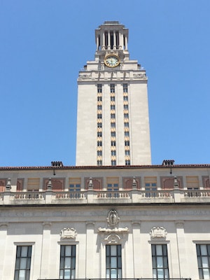 University of Texas tower against a bright blue sky