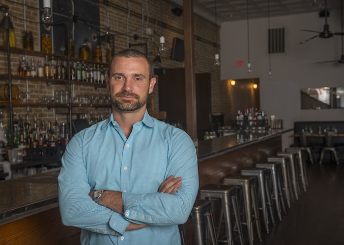 Chef Shawn Cirkiel stands in his Austin restaurant, Parkside